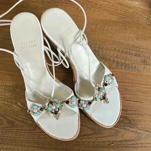 Stuart Weitzman sandals with multi color stones and wedge heel. Tie around ankle
